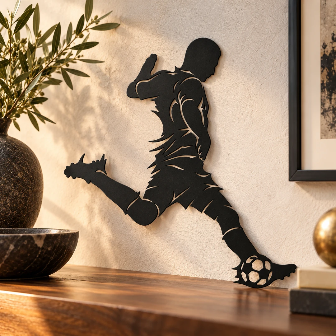 Art mural footballeur La frappe décisive sur un mur au-dessus d'une console